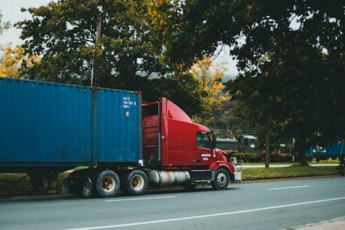 Truck rolls over and loses cargo in California